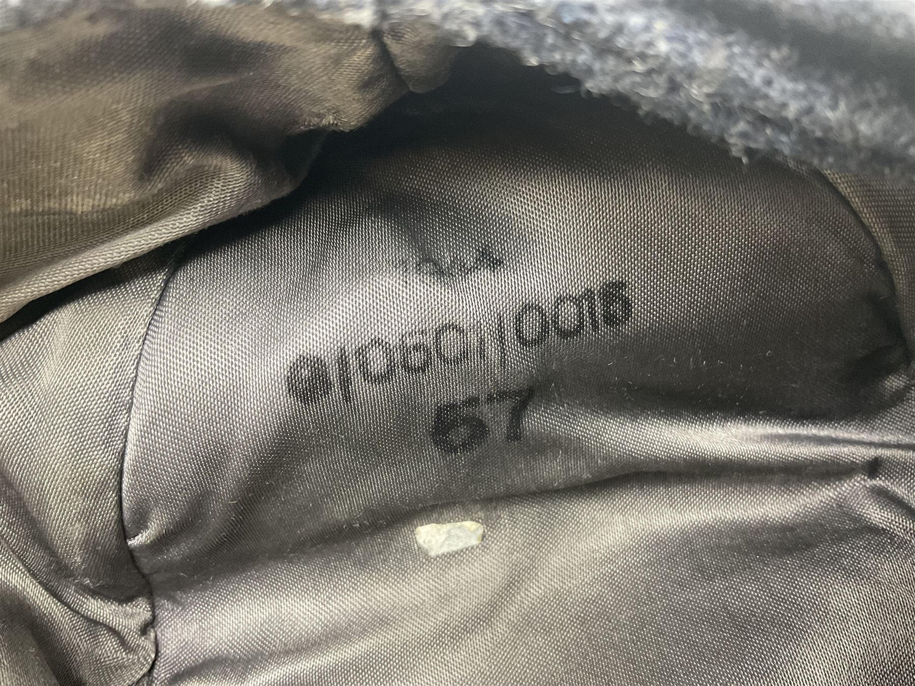 WW2 German Luftwaffe M43 field cap with triangular cloth eagle and roundel badge; marked '1944 ?/0501/0015 57'