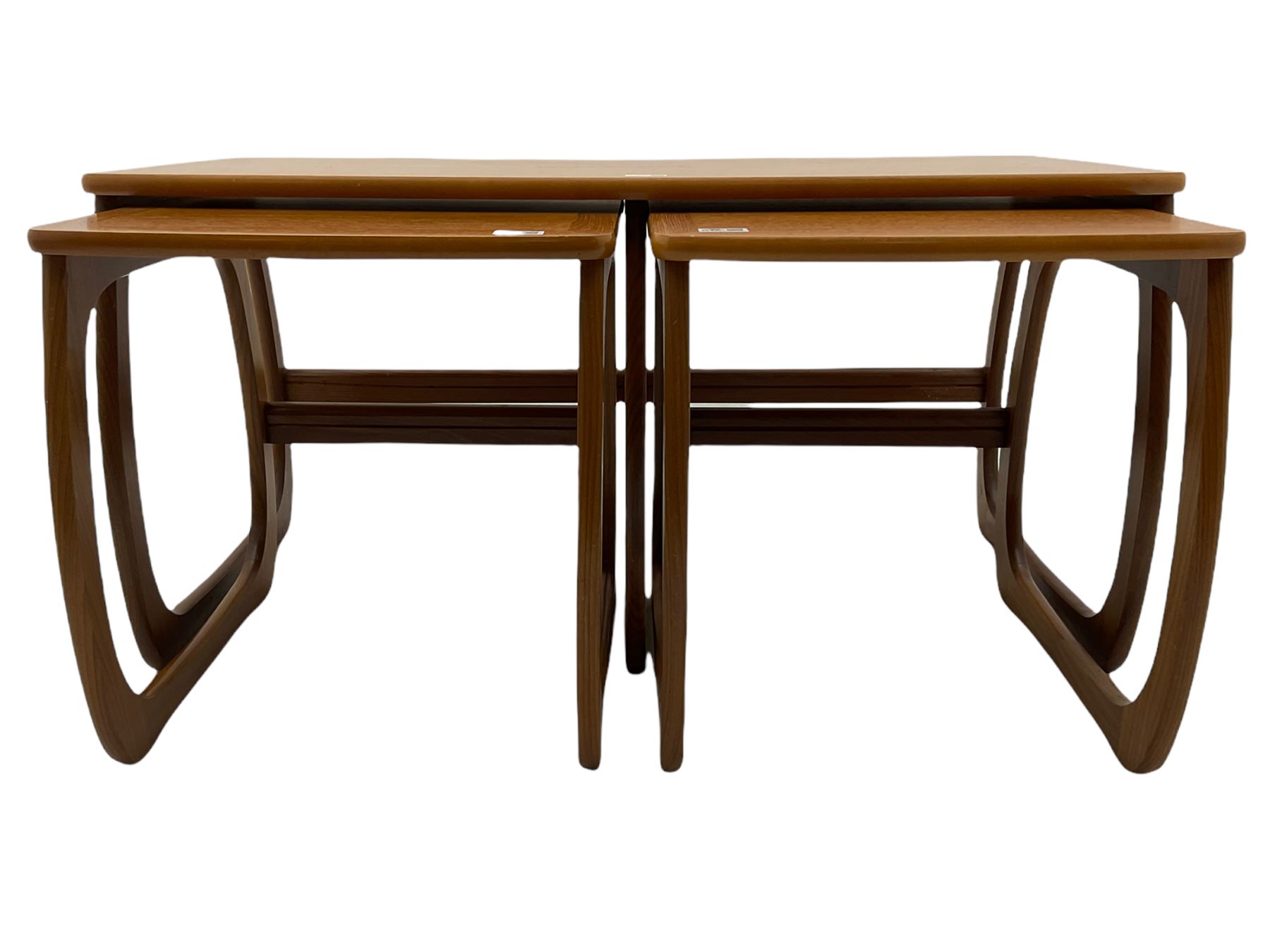 Nathan - teak Long John nest of tables and a singular nest of tables 