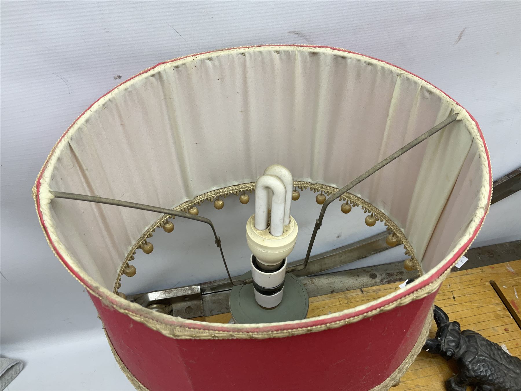 Coal bucket painted with flowers together with pair of bellows, boot scraper in the form of a beetle, wooden guillotine, composite table lamp with tassel lampshade and one other