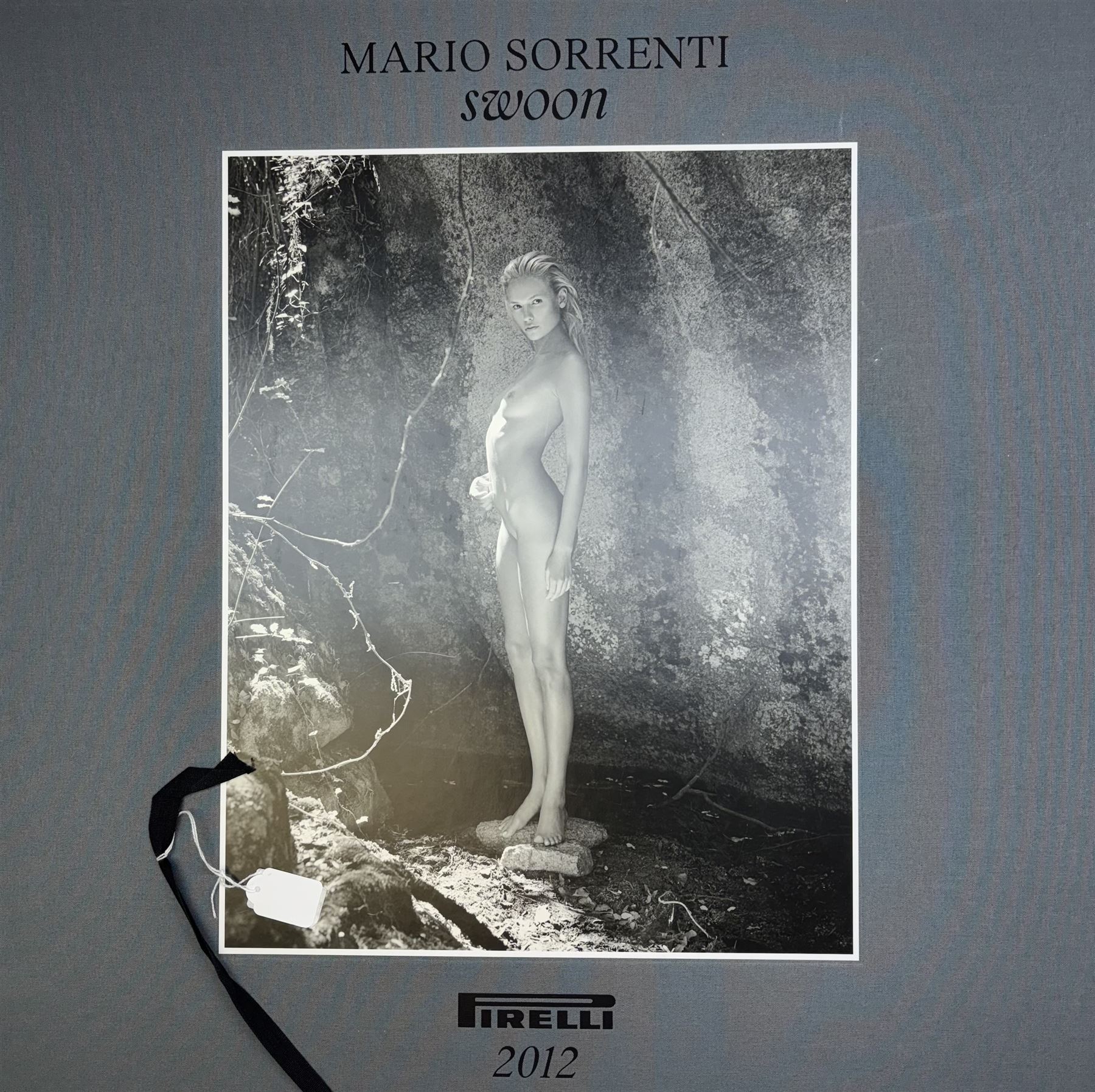 Two Pirelli calendars, 2011 Mythology by Karl Lagerfield and 2012 Swoon by Mario Sorrenti