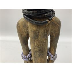 Early 20th century West African Yoruba family wooden figure of Orisha Oko, the god of farming/agriculture, carved from the solid, bears manuscript label of provenance verso H26.5cm