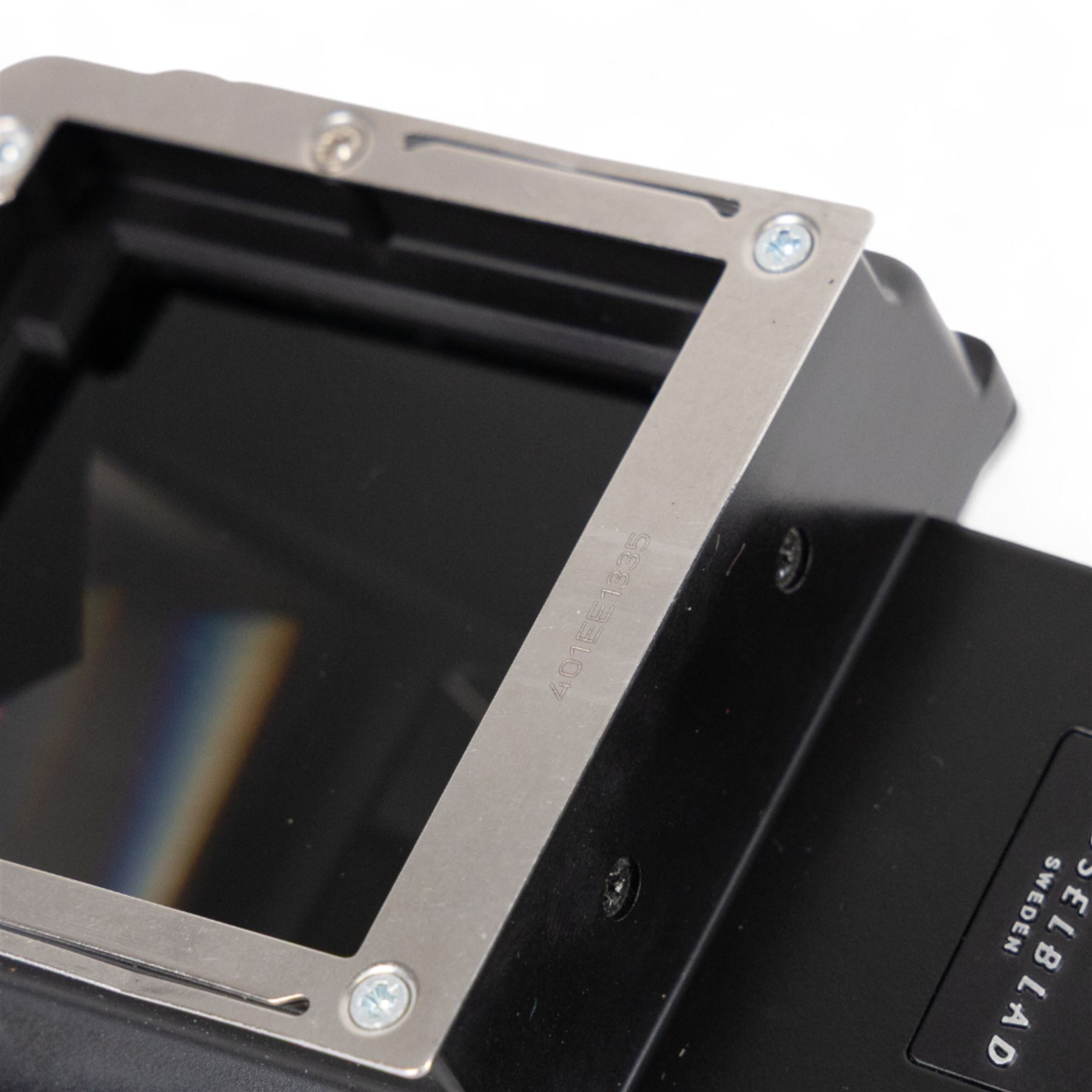 Hasselblad 500C medium format camera, serial no. TC60836, circa 1965, with Carl Zeiss Planar 1:2.8 f=80mm lens with cap, serial no. 4199654, one film back, serial no. TC87300 and a Hasselblad PM5 prism viewfinder serial no. 401EE1335