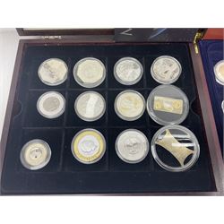 Single owner lifetime collection of mostly commemorative modern World coins with gold, silver and base metal examples, including two Queen Elizabeth II Bailiwick of Guernsey twenty-five pound gold coins 'The 1999 Royal Wedding' and '100th Anniversary of the End of the Victorian Era' 2001 each in 24 carat gold weighing 7.81 grams with certificates, silver coins commemorating the Millennium 2000 including Guyana sterling silver proof two-thousand dollars, Fiji sterling silver proof five dollars etc, silver coins from the Queen Elizabeth II Golden Jubilee Collection dated either 2002 or 2003 from Great Britain and the Commonwealth countries, United Kingdom commemorative crowns in card folders, The Royal Mint United Kingdom 1997 proof coin set in red folder without certificate etc