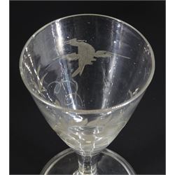 18th century drinking glass of possible Jacobite interest, the funnel bowl engraved with bird in flight and sunflower, upon a plain stem and folded conical foot, H11cm