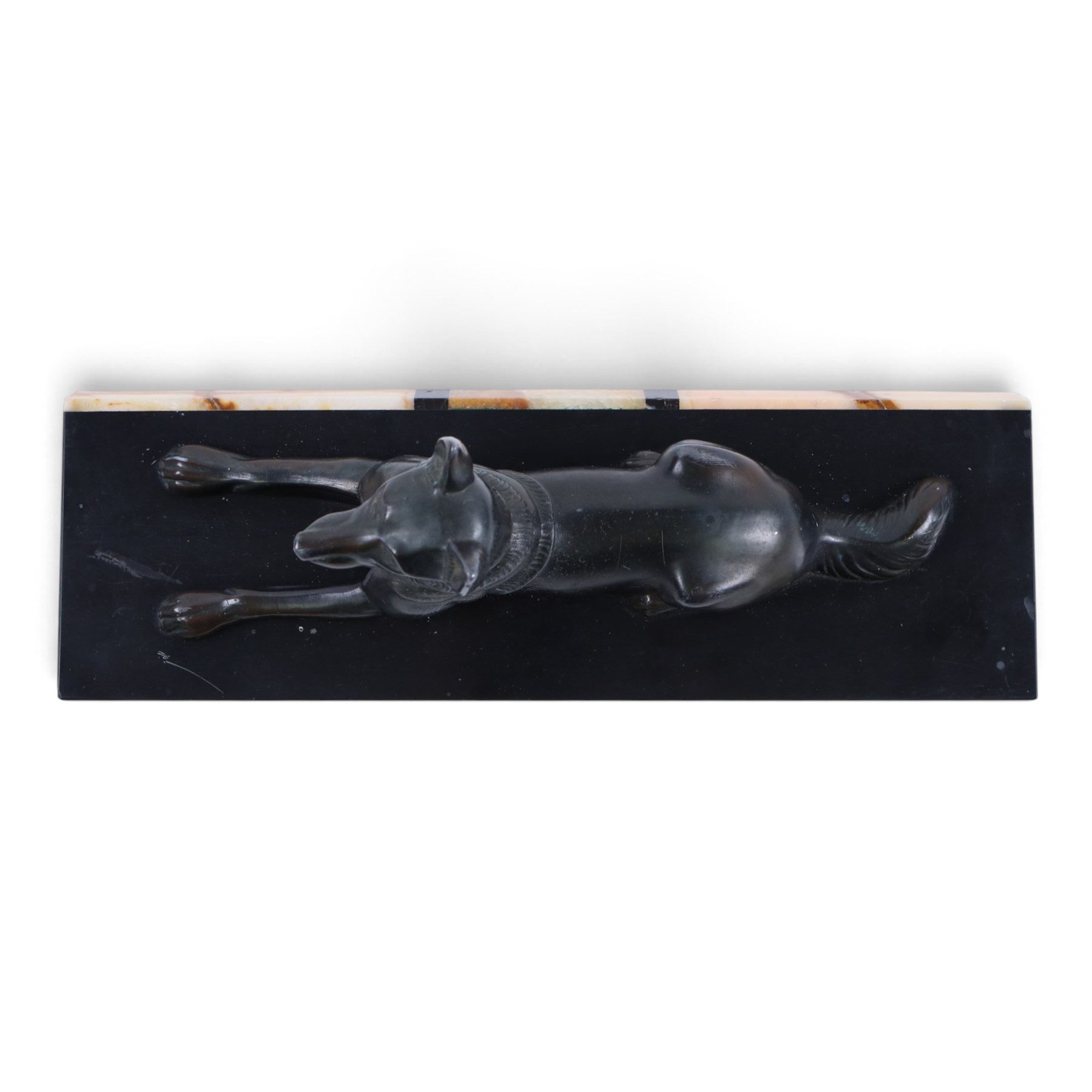 French Art Deco spelter figure of a recumbent dog on marble and onyx plinth, H14cm, L30cm