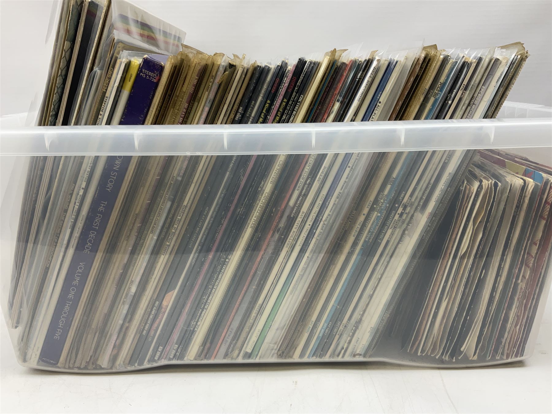 Large quantity of vinyl LPs, predominantly rock and pop, to include Elvis, Elton John, The Kinks, Deep Purple, Eurythmics, Whitney Houston, Phil Collins, Rolling Stones etc, in three boxes, together with quantity of 45 rpm records, Steepletone SRP1R-11 record player and record carry case