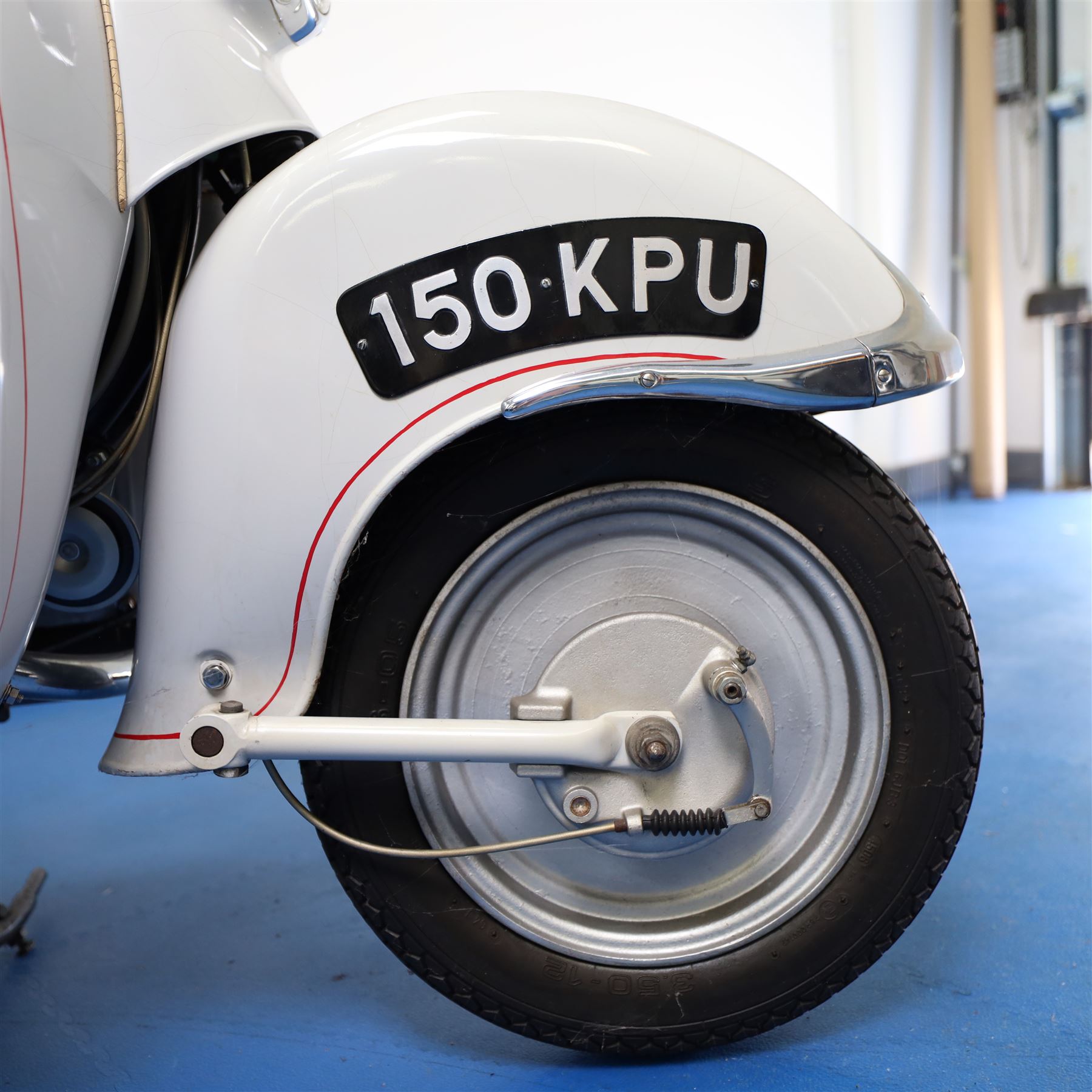 1957 Zündapp Bella R154 Scooter

• Registration: 150 KPU
• Year: 1957
• Model: Bella R154
• Engine: 150cc two-stroke single-cylinder petrol
• Transmission: Four-speed manual
• Odometer reading: 1,727 miles
• Colour: Ivory
• Seating: Dual seat
• V5C: Present
• Original registration book: Present
• Keys: 1

A characterful 1957 Zündapp Bella R154 scooter, finished in ivory with a contrasting brown dual seat and displaying an odometer reading of 1,727 miles.

The Bella R154 formed part of Zündapp’s distinctive range of German touring scooters, combining a 150cc air-cooled two-stroke engine with four-speed transmission, large wheels and substantial pressed-steel bodywork. This example retains its enclosed front apron, central headlamp, chrome handlebars, brightwork, period VDO speedometer and decorative Bella badging.

An operation and maintenance manual is include and accompanied by its V5C and original registration book from 1957.

This vehicle forms part of the Estate of the Late John Sills and is offered for sale by the Executors, confirming a genuine reason for sale.