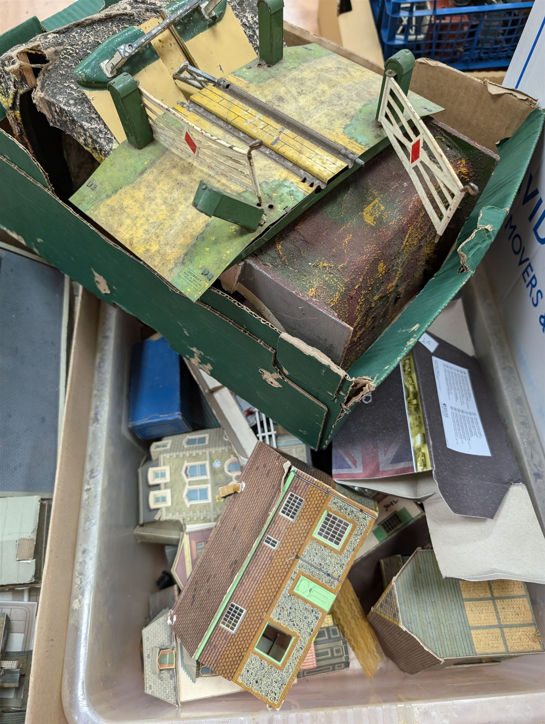 Collection of model railway buildings and other accessories, together with a box empty Hornby boxes, including three trainset boxes with pieces of track inside only