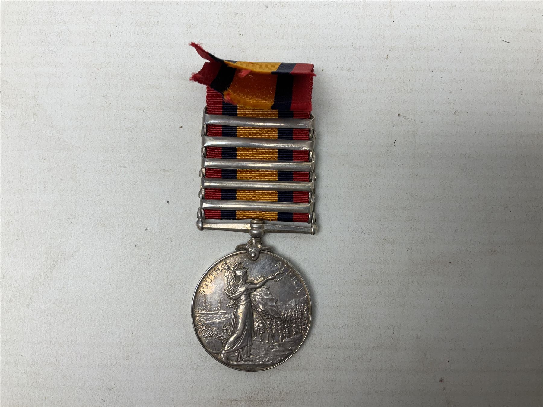 Queens South Africa Medal with five clasps for South Africa 1902/1901, Transvaal, Orange Free State and Cape Colony awarded to 4640 Pte. A. Farmer 1st Dgn. Gds. with ribbon and manuscript biographical details