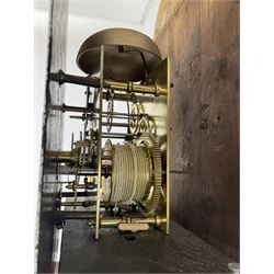 G Fortier of Sittingborn - Early 19th century 8-day mahogany longcase clock c1825, with a break arch pediment and hood door flanked by reeded pilasters with brass capitals, plain case with a long trunk door with a conforming break arch top, plinth with applied skirting, painted dial with upright Arabic numerals, date  and seconds dials, floral spandrels and a rural depiction of a country house and river to the arch, replacement steel hands with brass pointers to the calendar and seconds dials, dial pinned directly to a rack striking movement. With weights, pendulum and winding key.