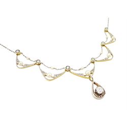 Early 20th century 18ct gold and platinum diamond and pearl necklace, five central fancy swag links, milgrain set with rose cut diamonds and a single pearl, with a trace link pearl top, each spaced by an old cut diamond, the central link suspending an old cut diamond of approx 0.55 carat, to a platinum trace link chain necklace, total diamond weight approx 0.75 carat