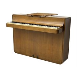 Louis Zwicki - mid-20th century oak cased compact piano, fitted with a folding music rest and full keyboard, dual brass pedals