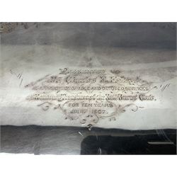 Oval silver plate twin handled tray, egg and dart edge, engraved with floral springs surrounding an central inscription, L65cm