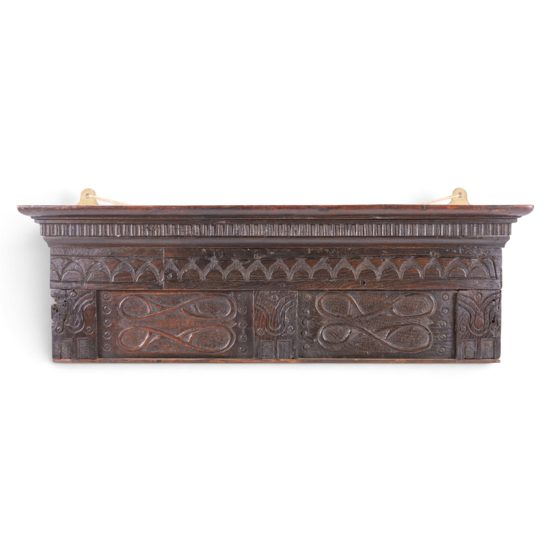 18th century and later carved oak panel, the carved cornice above a repeating boarder and two panels, H25cm, L81cm