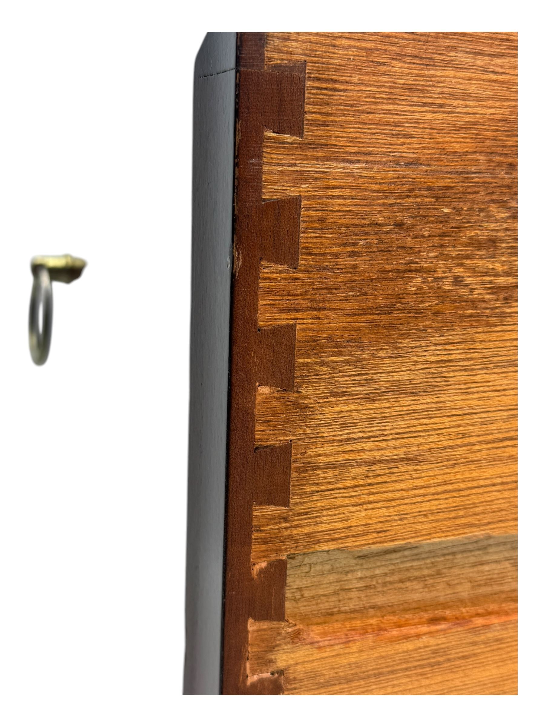 Stag Minstrel - mid-20th century mahogany dressing chest, rectangular top surmounted by adjustable mirror, the upper section fitted with four small drawers over two full-width drawers, on bracket feet