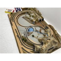 '00' gauge - table-top moulded plastic model railway layout with various rocky outcrops, tunnels, waterfall to lake, loops of Fleischmann track supplemented by Hornby track, bridges, kit built buildings and other accessories; together with Bachmann Class 150 2-car DMU Set and Hornby Northern Rail Class 142 2-car Set; both boxed; and small quantity of other rolling stock, three controllers etc  200 x 120cm