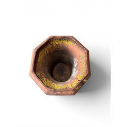 Small 19th century terracotta octagonal planter with stand, flower and leaf design