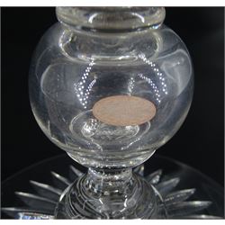 Late 19th century oversized glass goblet, the bowl engraved with cartouche containing dedication 'Jams Michie Died Jan 6th 1871 Aged 26 Years', surrounded by foliate detail, upon a hollow knopped stem containing a silver Victorian 1861 threepence and circular foot with star cut base, H19.5cm