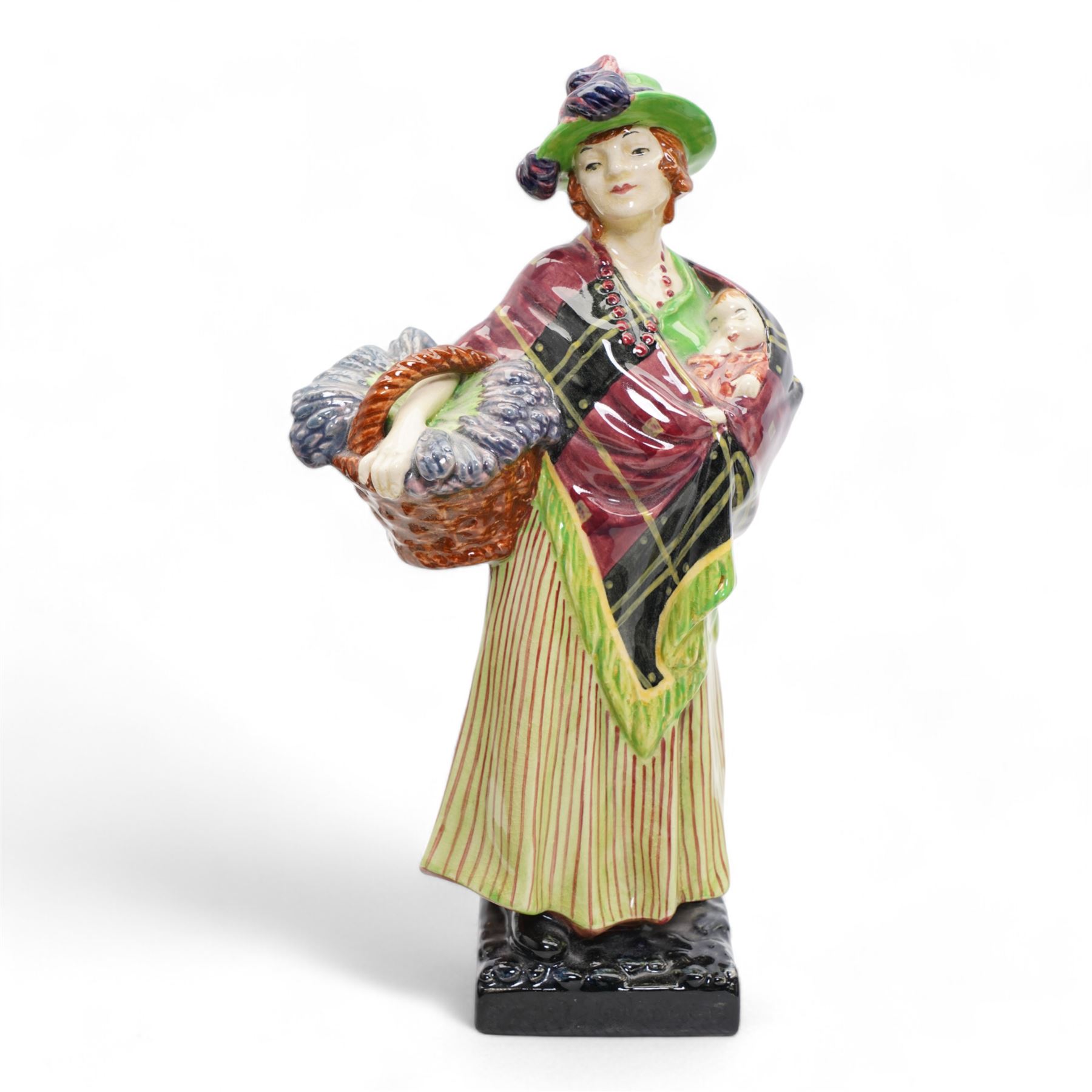 Four Royal Doulton figures comprising 'Sweet Lavender' HN1373, 'The Balloon Seller' HN583, 'Biddy Pennyfarthing' HN1843 and 'Silks and Ribbons' HN2017 (4)