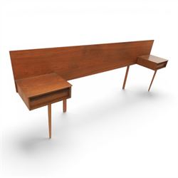 Austinsuite - mid 20th century teak headboard with bedside cabinets and matching  mirrored dressing table, the headboard with floating single drawer bedsides raised on a single tapering support, the dressing table with attached tilting mirror, above rectangular top with kneehole and two banks of two drawers, raised on tapering supports

Headboard H 84cm, D 40cm, W 229cm, W between bedsides 151cm 
Dressing table H 113cm D 44cm, W 149cm, H to underside of dresser 61cm