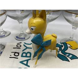 Breweriana; Eight Babycham glasses together with a Babycham plastic fawn mascot and linen I'd Love a Babycham tea towel