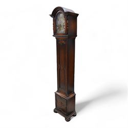 Oak cased 8-day grandmother clock c 1930 - with a broken arched pediment and break arch hood door flanked by turned pilasters, carved full length trunk door on a short plinth raised on bun feet, brass dial with cast spandrels, matted dial centre and silvered chapter with Roman numerals, three train spring driven movement chiming the quarters and hours on 8 gong rods.  With pendulum.
