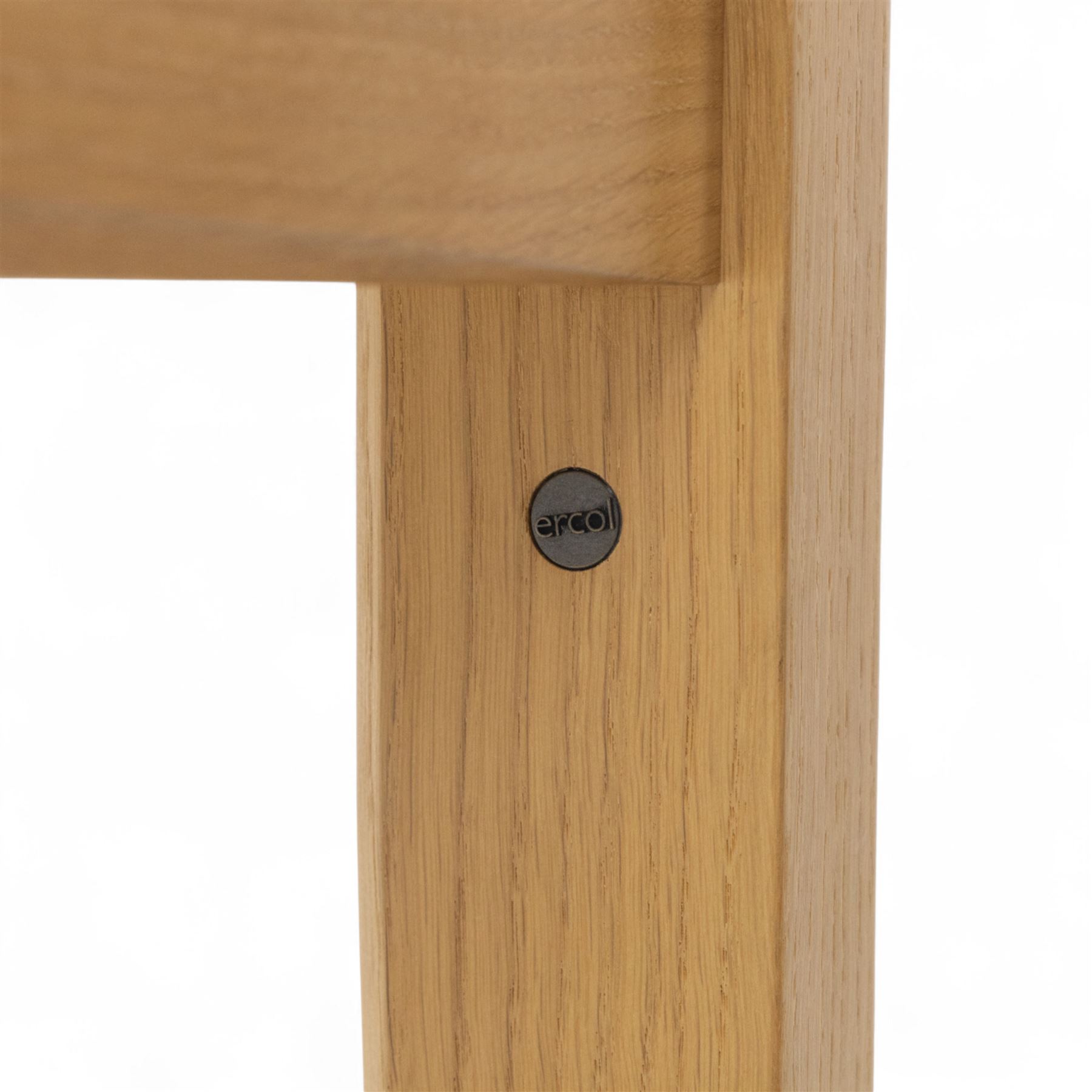 Ercol - light oak ‘Artisan’ rectangular dining table with chamfered top extending fold over top and tapered legs, together with two matching high back dining chairs upholstered in textured beige fabric (Chairs H 98cm, W 47cm, D 52cm)