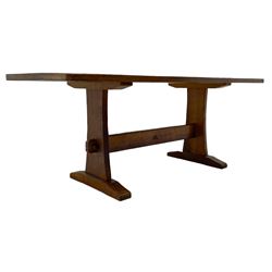 Yorkshire Oak 'Kingpost' - oak dining table, rectangular adzed top on tapered end supports, united by pegged stretchers carved with kingpost signature, on sledge feet, by Robert Ingham, Burton Leonard, Harrogate 