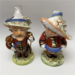 Pair of limited edition Royal Crown Derby Golden Jubilee Mansion House Dwarfs, Tall and Low Dwarf, dressed in Royal Guard uniform, H18cm, exclusive to Mulberry Hall 35/50, each with printed mark beneath, and signed M.E.Reynolds and J Morrison, with makers box. 