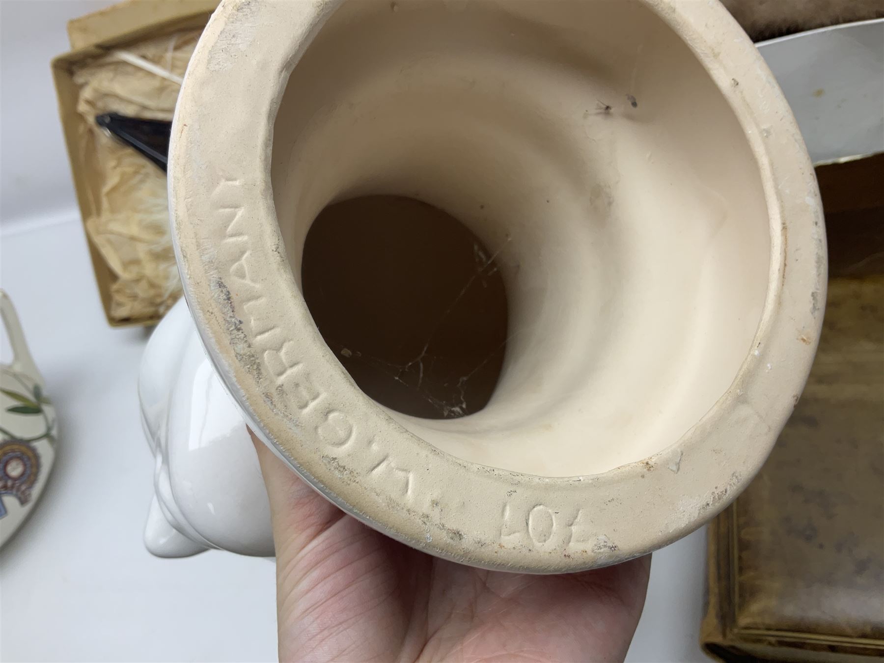 White Ostrich feather fan, together with ceramic head, leather bound photo book, Wedgwood chamber pot and other collectables 