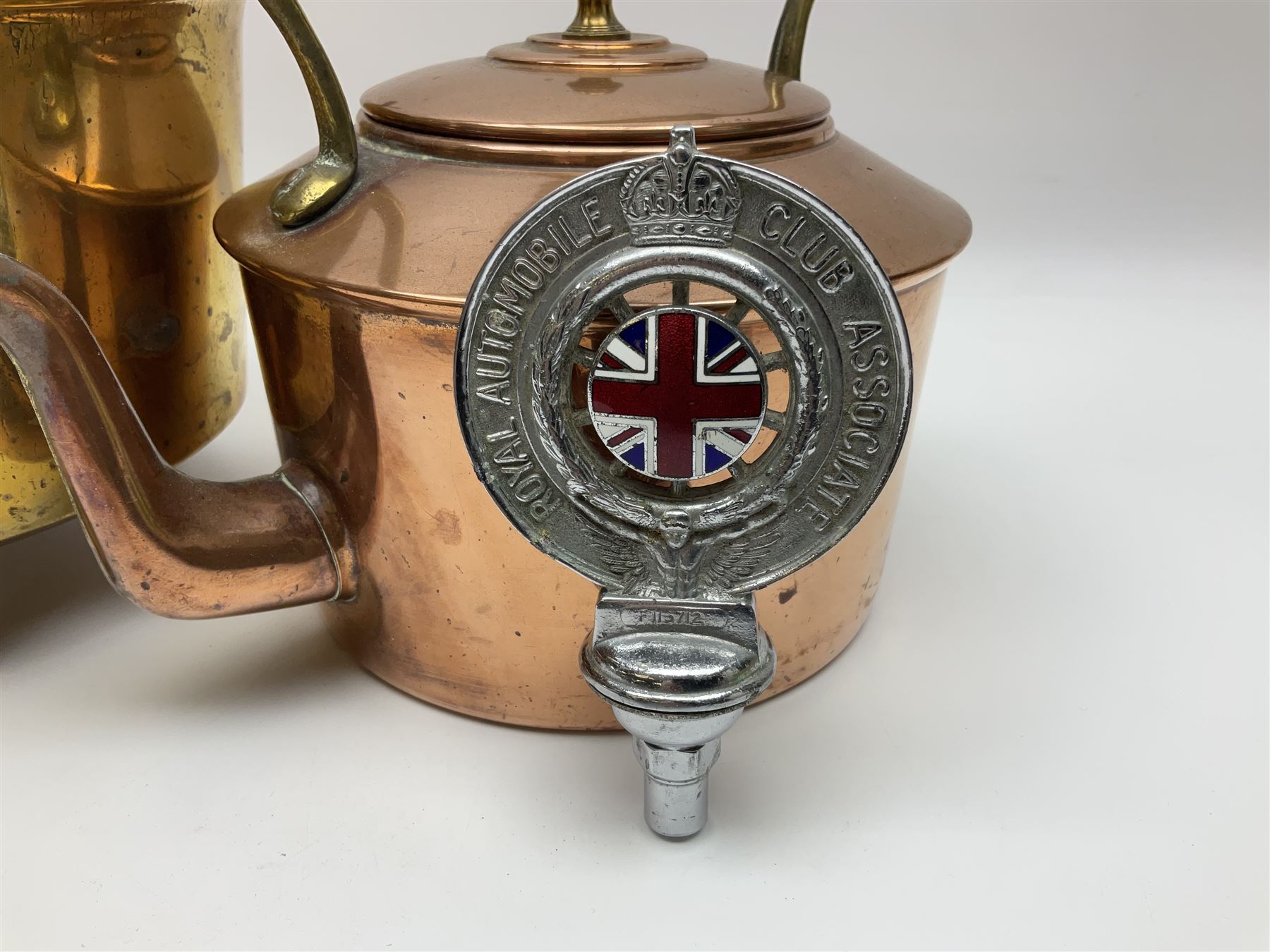 Brass coal bucket, embossed with lion to front and 1529 verso, together with an Royal Automobile Club Associate car badge and a copper kettle, bucket H 18.5cm