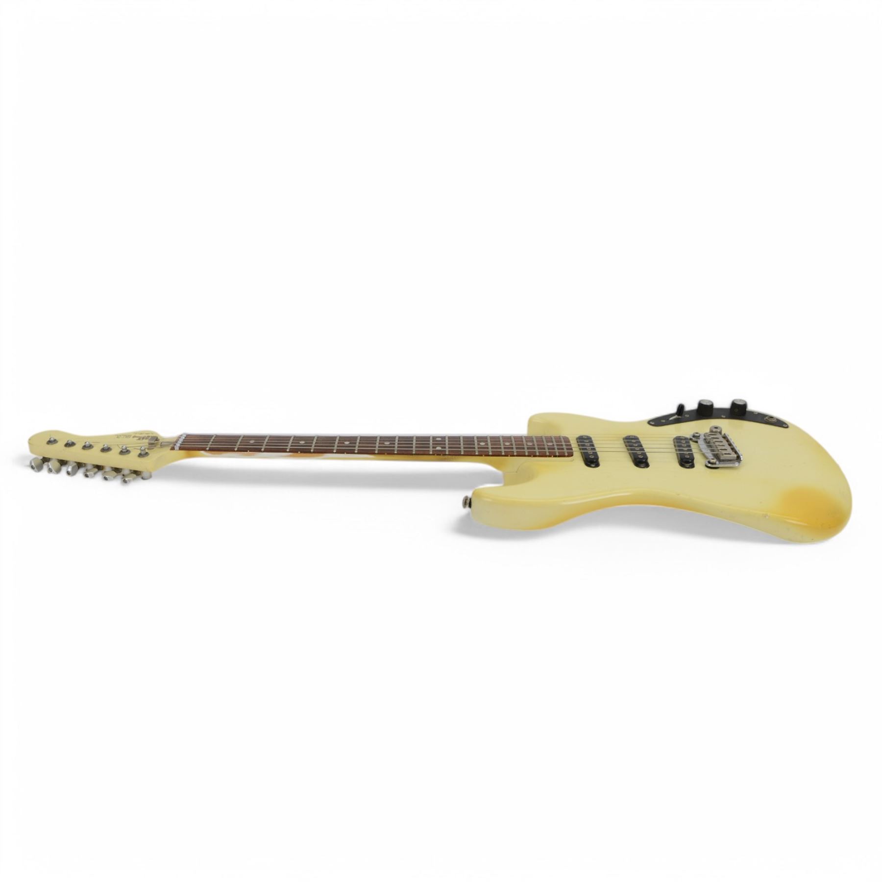 1980s G&L by Leo Fender SC3 electric guitar, in cream finish, made in USA serial no. G021189, contained within a hard carry case