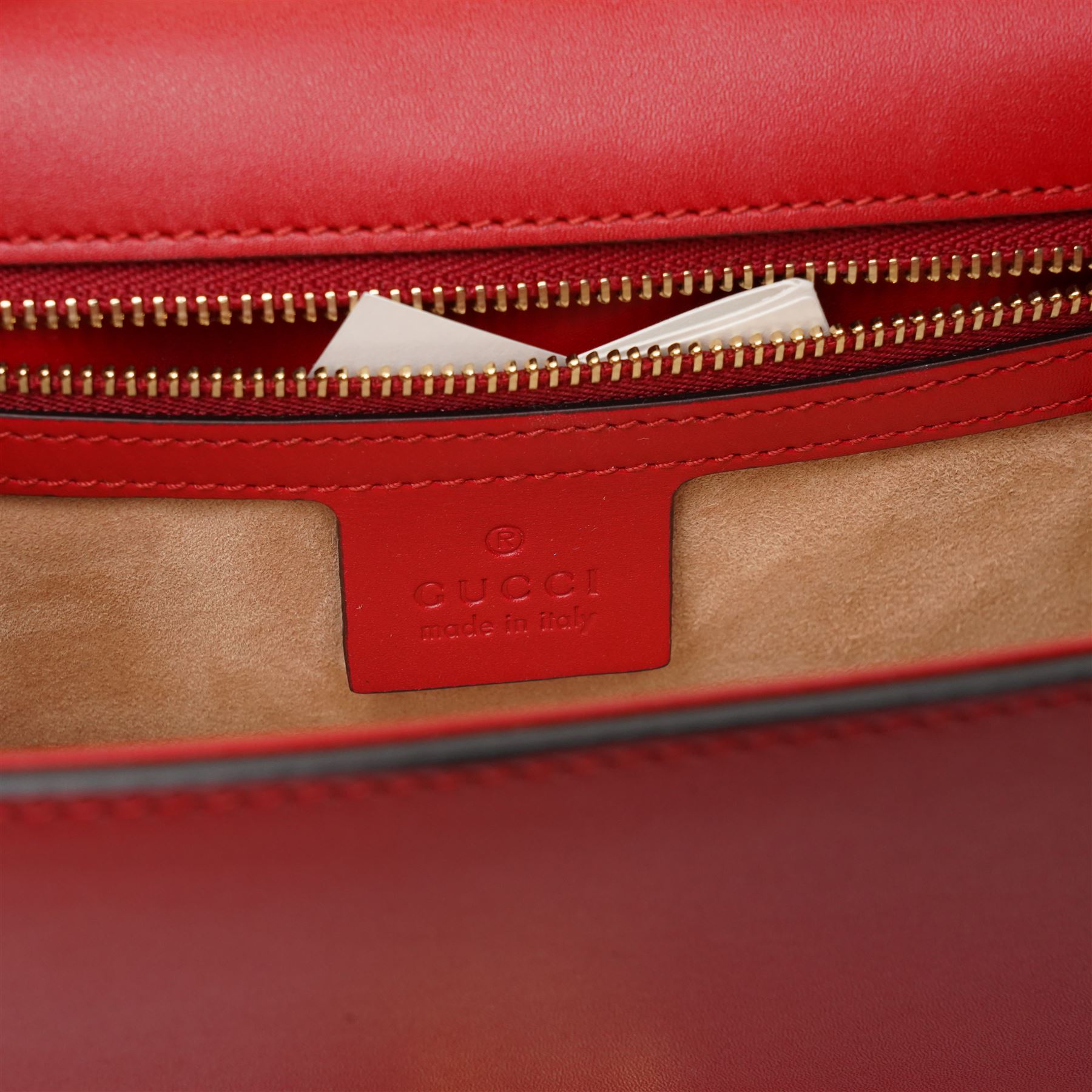 Gucci - ‘Sylvie’ Small Shoulder Bag, introduced circa 2016 under Alessandro Michele, in red calfskin leather with signature web stripe, gold-tone chain and buckle fastening and hardware, flat leather shoulder strap with alternative web-stripe grosgrain strap, unused with original dust bag