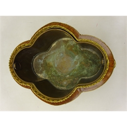  Late 19th/ early 20th century French kingwood two handled jardiniere of quatrefoil form with foliate gilt metal mounts, two porcelain panels hand painted in the Sevres style with a winged cherub and floral sprays below a pierced gallery, with removable tin liner, L36cm x H17cm x D25cm. Provenance Property of Bob Heath, Brandesburton Formerly of Ravenfield Hall Farm near Rotherham  