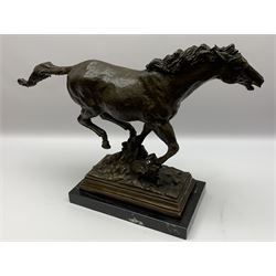 Large bronze study modelled as a horse in full gallop, with naturalistically modelled base, signed Milo, upon black marble base, H39cm L59cm