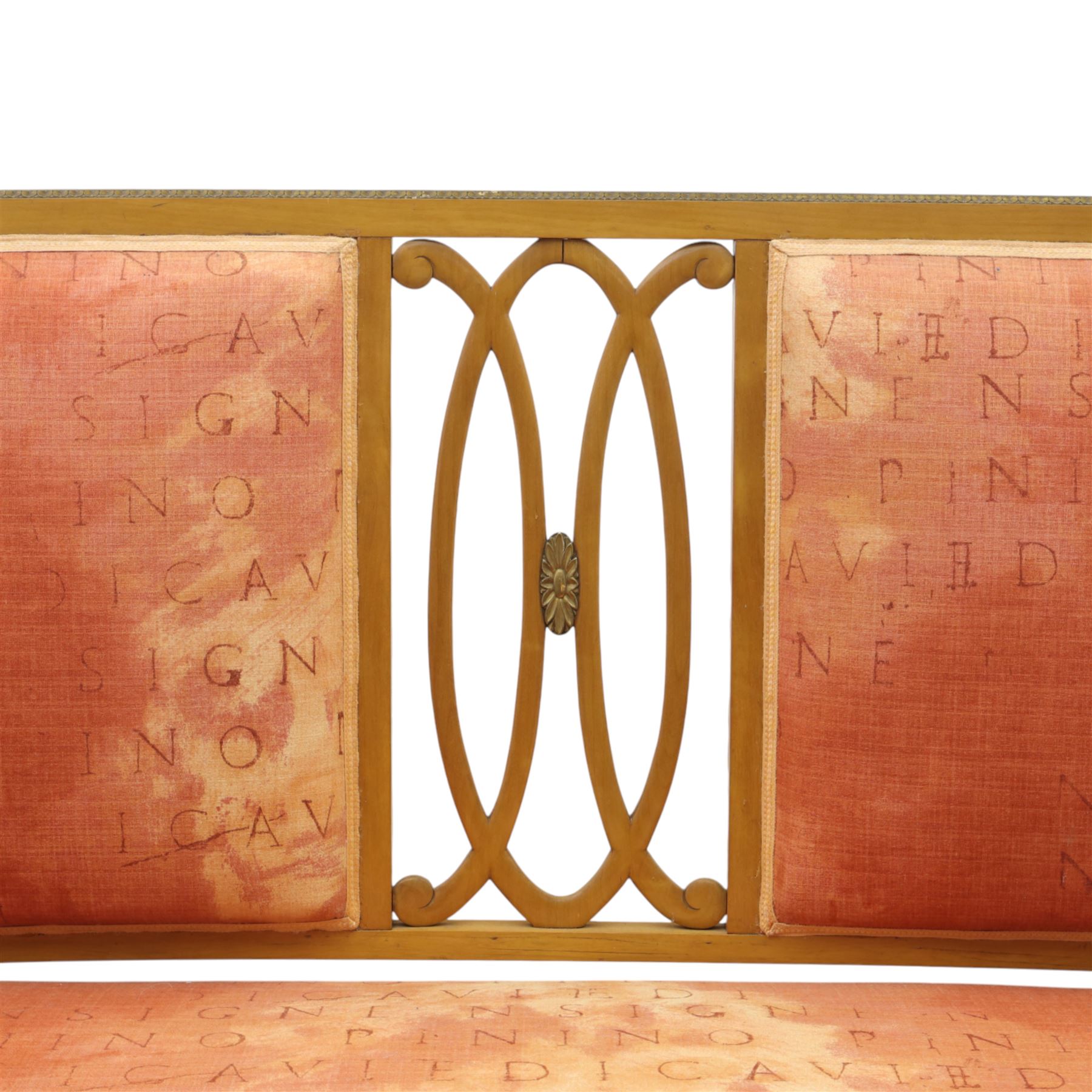 Edwardian satinwood settee, the shaped and bowed top rail enclosing a pierced splat with interlaced oval slats, flanked by upholstered back panels, the padded arms with scrolling terminals, the upholstered seat raised on cabriole supports with pad feet