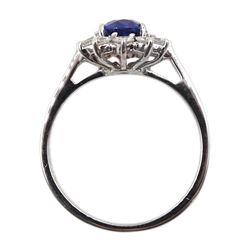 18ct white gold oval sapphire and diamond cluster ring, hallmarked, sapphire approx 1.40 carat, total diamond weight approx 0.25 carat