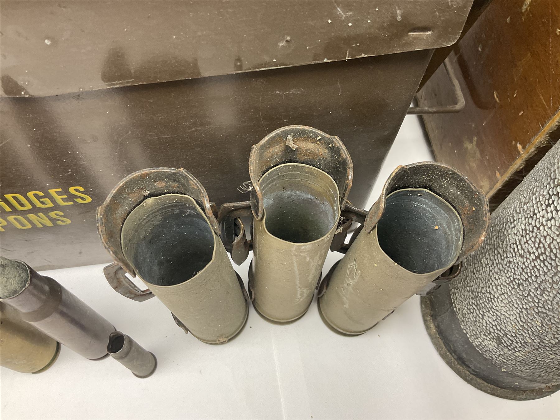 Large collection of shell and bullet casings, including a trench art example, together with a metal cartage case and wooden case
