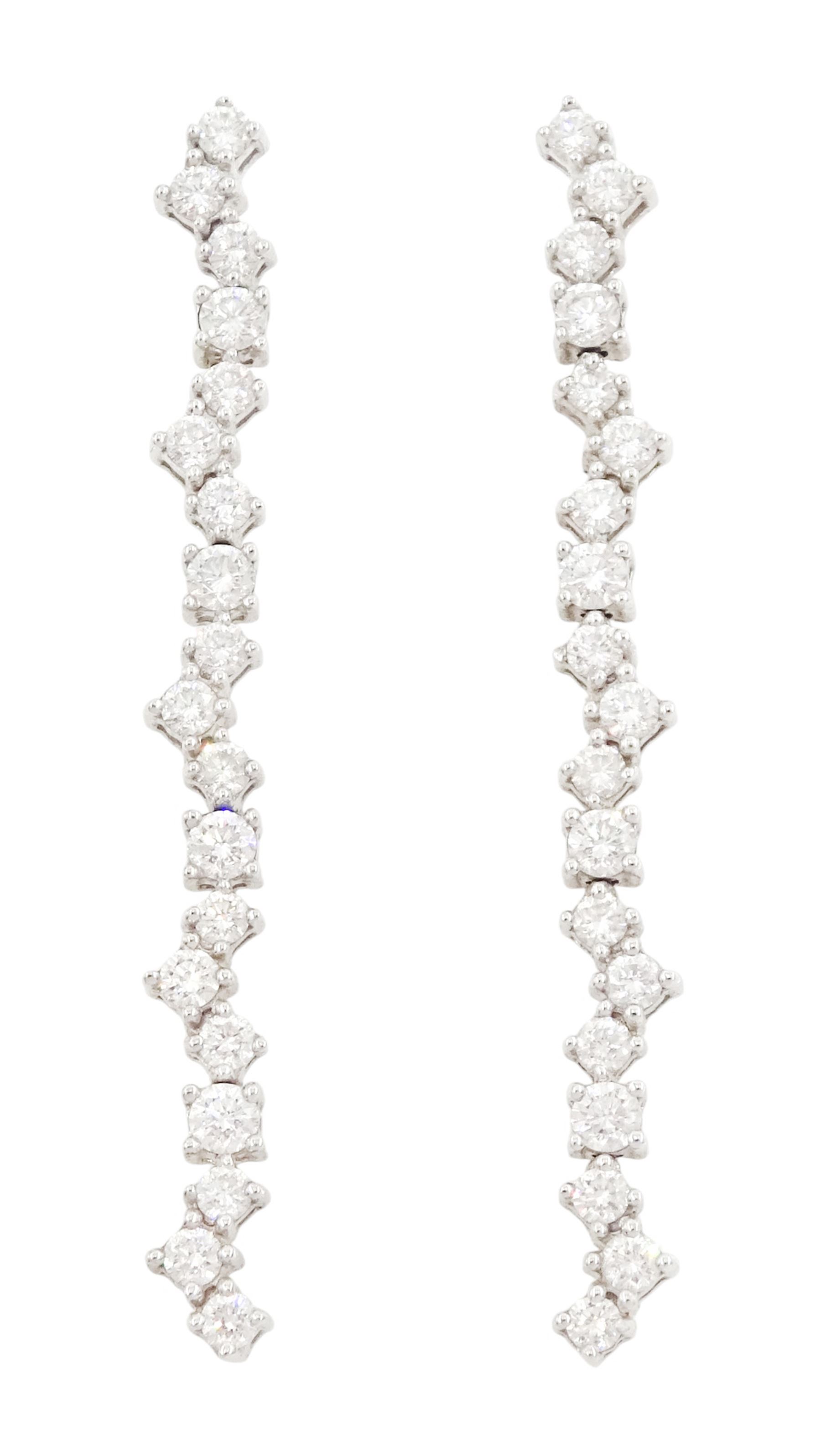 Pair of 18ct white gold round brilliant cut diamond pendant stud earrings, hallmarked, total diamond weight approx 1.00 carat