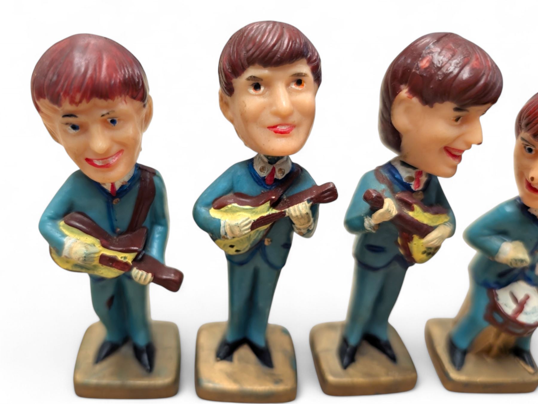 Set of four The Beatles plastic nodding / bobble head figures, H10cm
