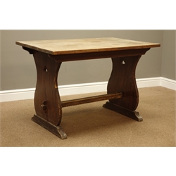  20th century rectangular mahogany table, shaped end supports with stretcher, (107cm x 69cm, H71cm), and a planked waxed pine top table on wrought metal Singer sewing machine base (110cm x 65cm, H76cm)  