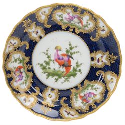 Late 19th/early 20th century Samson, Paris porcelain vase and cover, of baluster form, decorated after Worcester with gilt C scroll surround reserves painted with exotic birds, and insects and butterflies, upon a blue scale ground, H25cm, together two similarly decorated late 19th/early 20th century Samson, Paris cabinet plates, one example with spurious fret mark beneath, D22cm