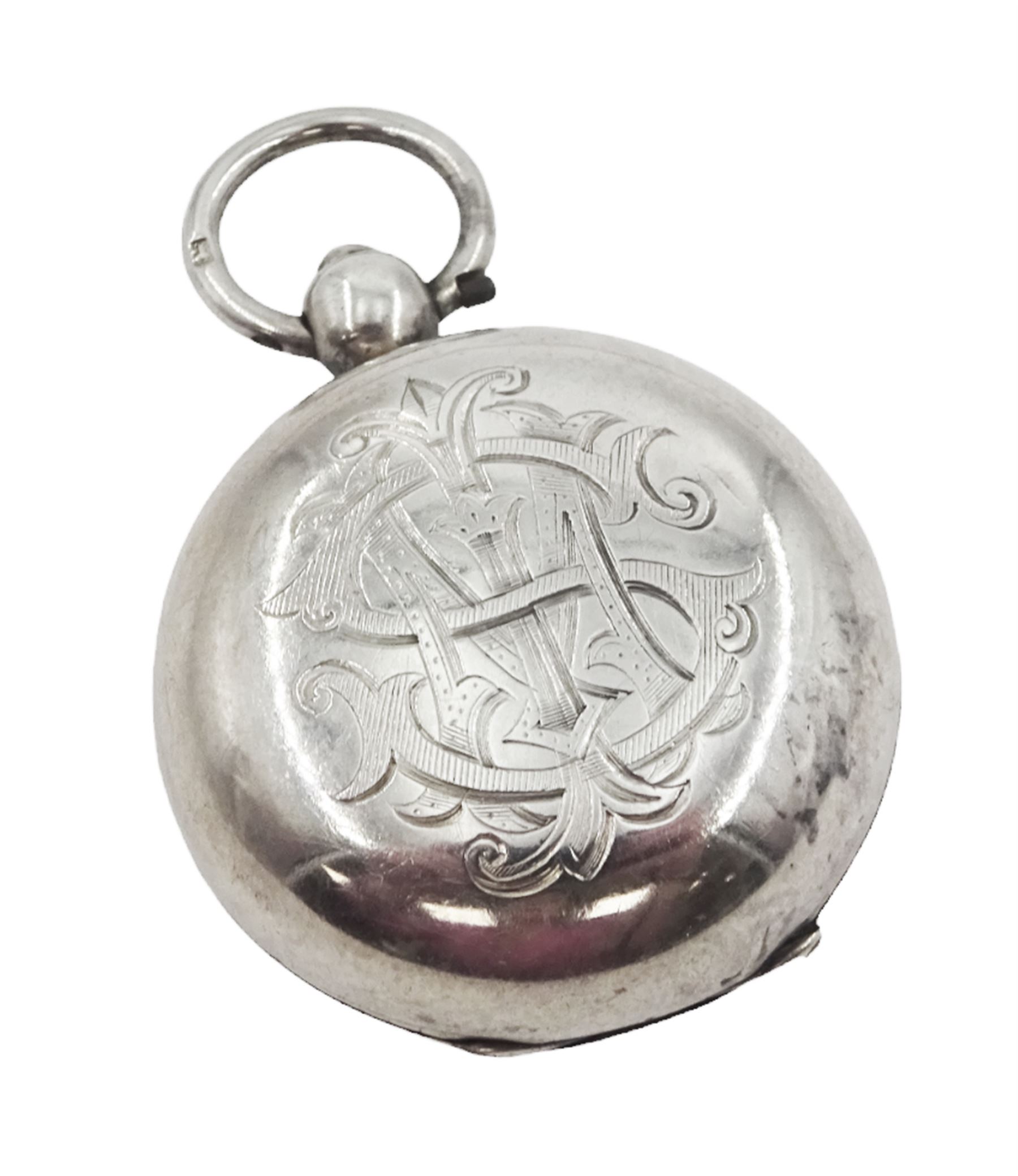 Early 20th century silver sovereign holder, of circular form, engraved with monogram, hallmarked William Luckett, Birmingham 1910, D3.5cm