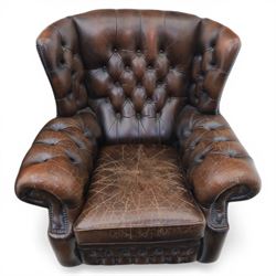 Georgian design Chesterfield lounge suite, comprising highbacked four seat sofa and pair armchairs, upholstered in chocolate brown leather, Armchairs (H 90cm, W 91cm) Sofa (H 91cm, W 238cm)