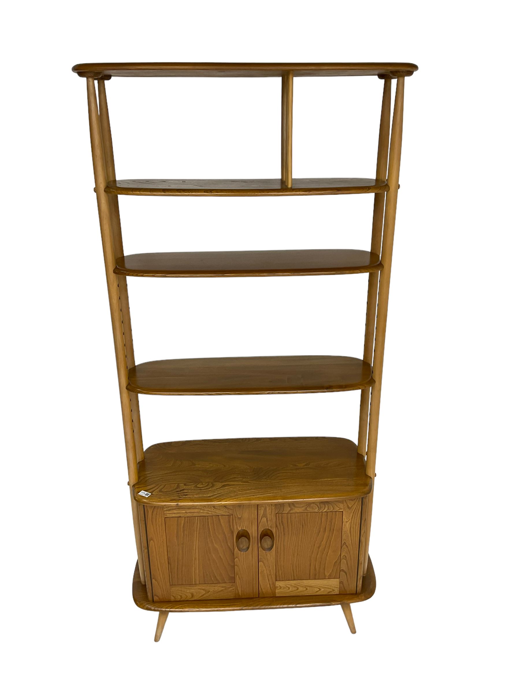 Ercol - 'Giraffe' elm and beech room divider, fitted with shelves and double cupboard