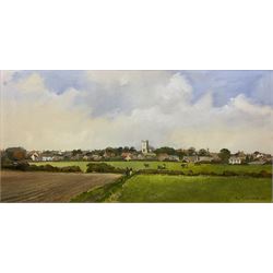 Don Micklethwaite (British 1936-): 'Flamborough Church and Village Looking from Danes Dyke', oil on board signed and dated 1998, titled verso 37cm x 75cm