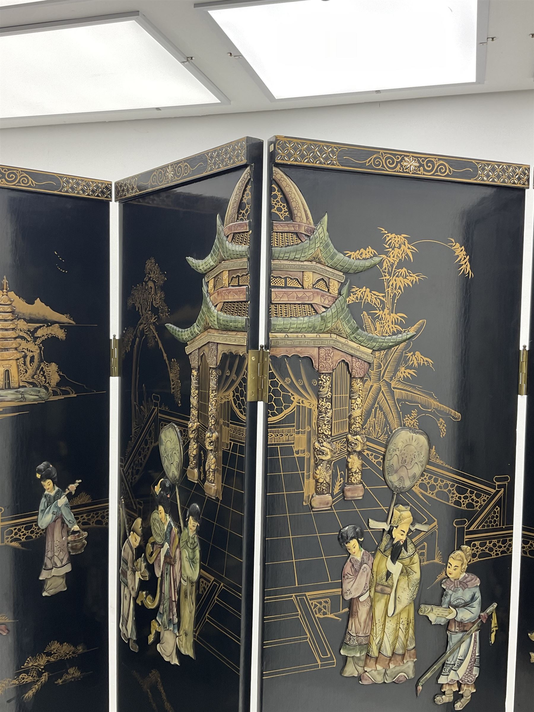 Japanese black lacquered four panel screen, with shibayama type decoration 