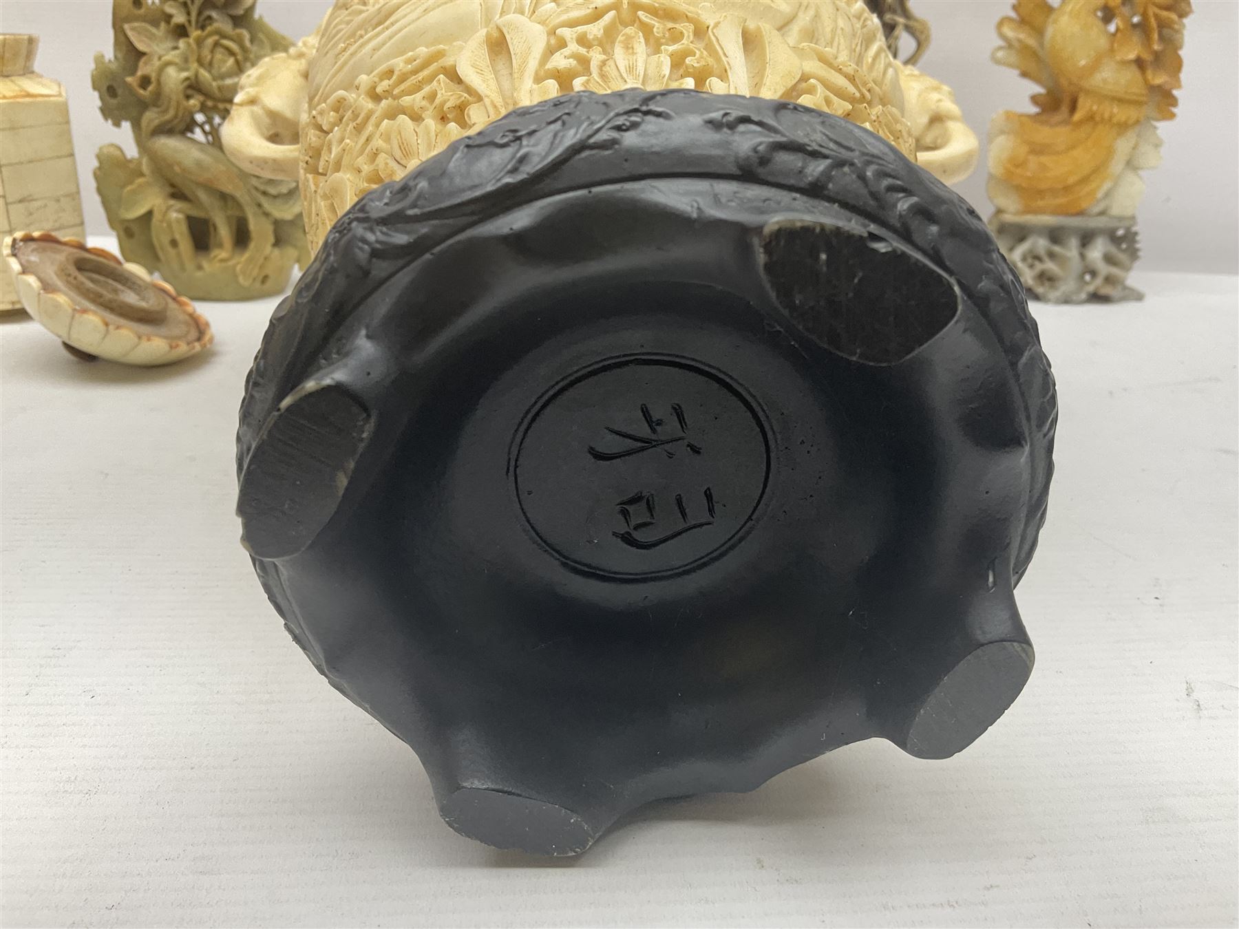 Collection of hardstone and soapstone, including hardstone seal carved temple dogs finial, inscription on base, together with inkwells, vases etc  