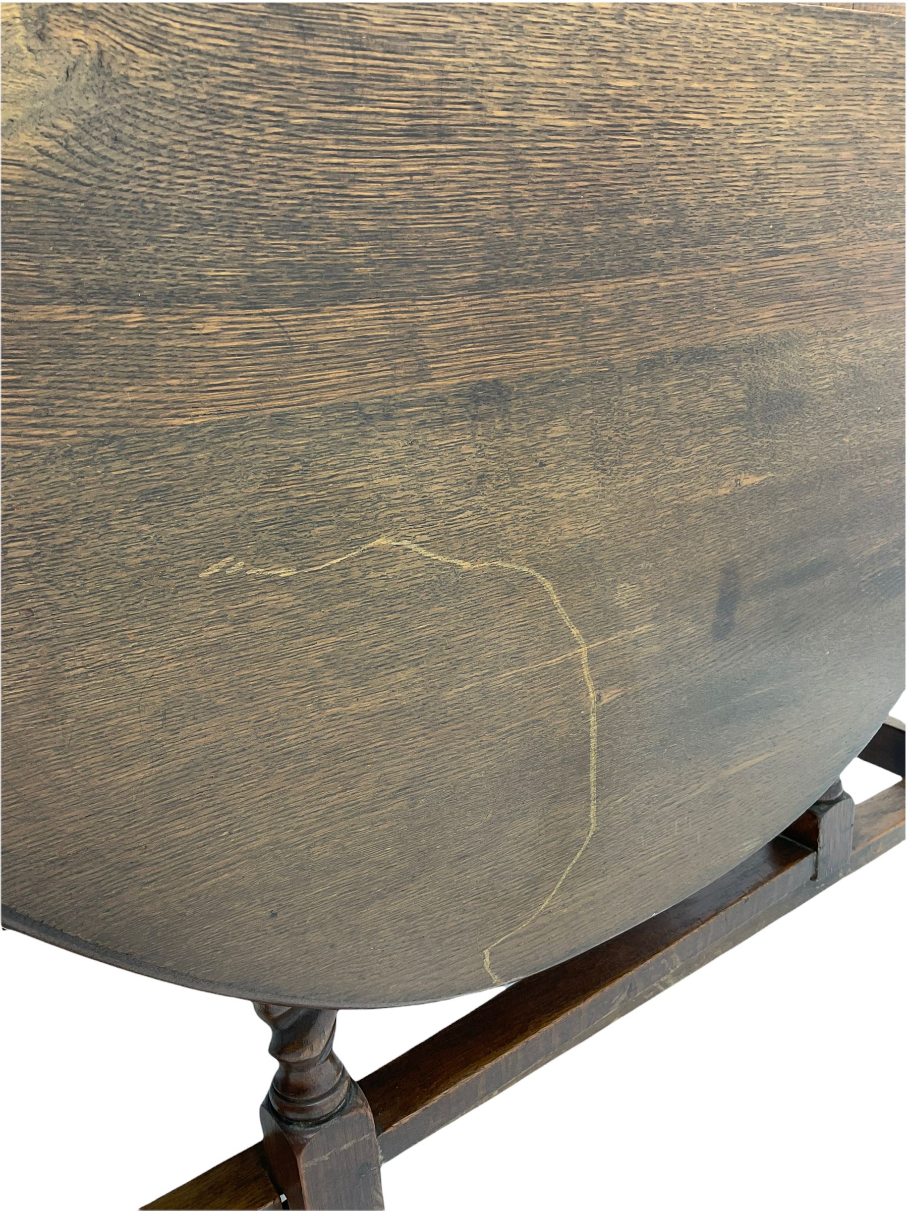 Early 20th century oak barley twist drop leaf dining table (105cm x 154cm, H74cm), and four chairs 