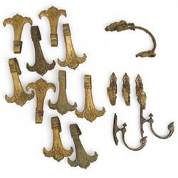 Set of ten late 19th century gilt bronze curtain tie backs with shell and swag design H25c...